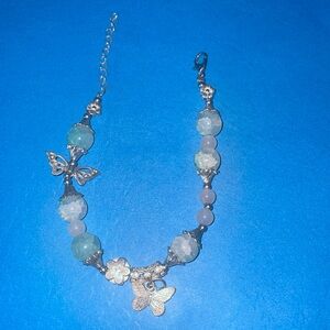 A turquoise and clear beaded patch hook bracelet